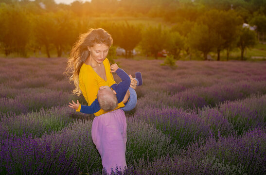 Mother and her baby in a lavender field