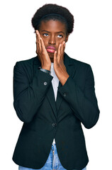 Young african american girl wearing business clothes tired hands covering face, depression and sadness, upset and irritated for problem