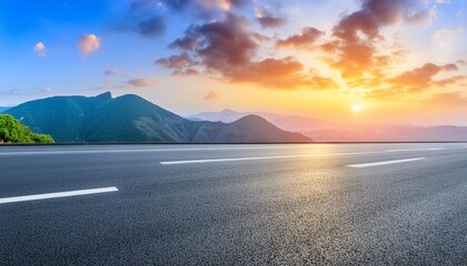 asphalt road and mountain with sky clouds landscape at sunset