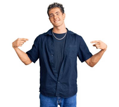 Young handsome man wearing casual clothes looking confident with smile on face, pointing oneself with fingers proud and happy.