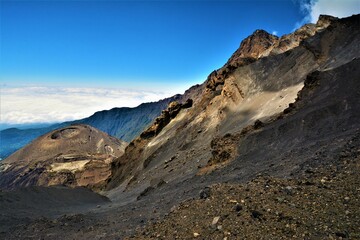 Smaller volcanic cone or crater as seen during the Mount Meru (4562 m, a dormant stratovolcano and...