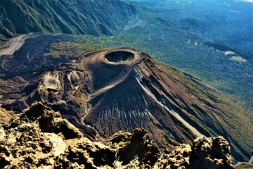 Smaller volcanic cone or crater as seen during the Mount Meru (4562 m, a dormant stratovolcano and...