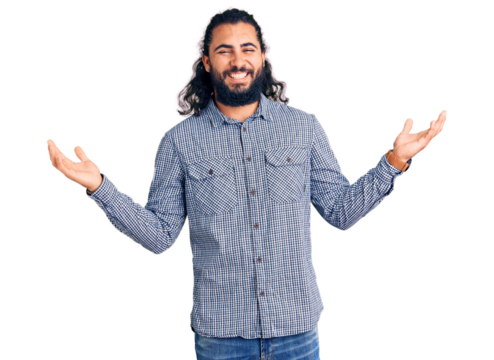 Young arab man wearing casual clothes smiling showing both hands open palms, presenting and advertising comparison and balance