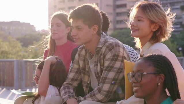 Portrait of group of cheerful young multiracial university students posing smiling. student community Gen z diverse friends having fun together indoor