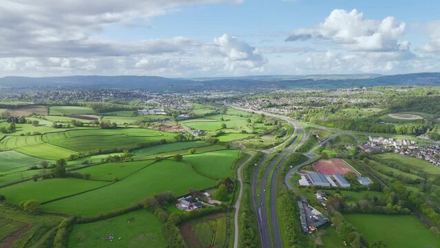 Farms and Fields over Kingskerswell and Road A380 from a drone, Devon, England