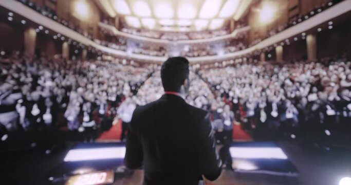 Young Political Tech Mogul Speaking at Large Crowd Business Corporate Conference Applause Success Charisma Financial CEO UHD 4K