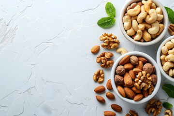 Fototapeta premium Variety of nuts in bowls a mix of superfoods for recipes and cuisine