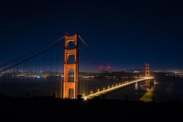 Illuminated golden gate bridge at night