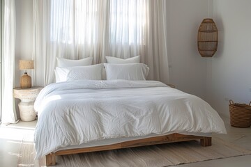 Serenely lit minimalistic bedroom with a cozy bed adorned in white linen and elegant decor for a tranquil atmosphere