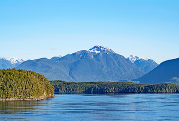 The Inside Passage offers magnificent coastal scenery with snow still on the tops of the mountains.