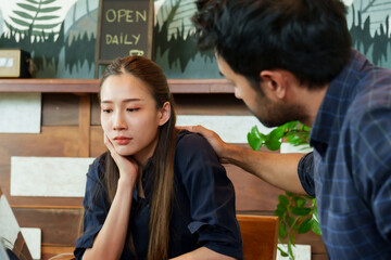 Cafe owner small business Barista staff multiracial men Sitting looking comforting face Asian...