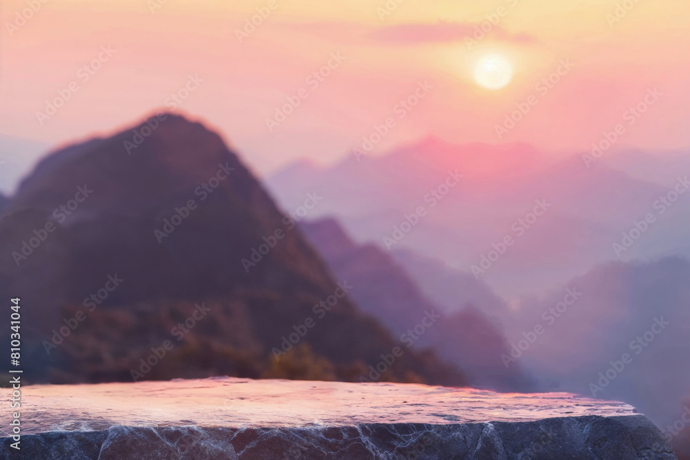 Poster sunset view over misty mountains with foreground of rough stone surface. ideal for tranquil product 