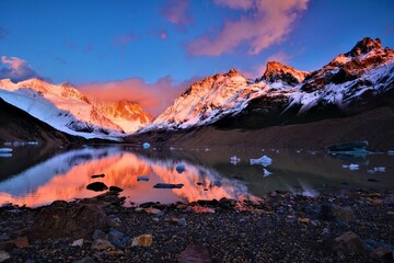 Magical sunrise at Laguna Torre with Cerro Torre (east face, highest point 3128 m) in the...