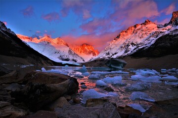 Magical sunrise at Laguna Torre with Cerro Torre (east face, highest point 3128 m) in the...