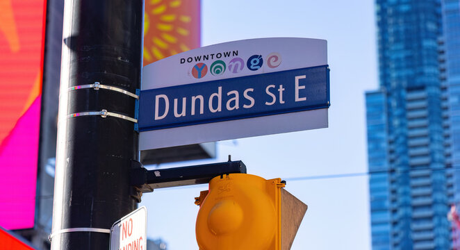 Dundas street sign in the downtown area of Toronto - TORONTO, CANADA NORTH AMERICA - APRIL 18, 2024