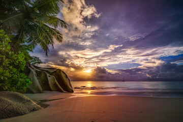 Tropical sunset at serene beach