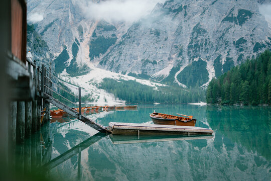 Tranquil mountain lake with rowboats