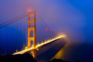 Golden gate bridge shrouded in evening fog