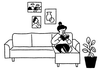 Woman reading a book on the living room sofa_2