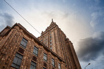 Panorama of Riga with a focus on the building of the latvian academy of sciences, or latvijas zinatnu akademija. It's a vintage skyscraper, a landmark of soviet stalinist architecture in Riga, Latvia.