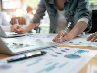 Concept of tax deduction strategy. Businessmen who compute their business balance prepare the tax reduction.