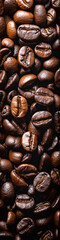 A close up of coffee beans with a dark brown color