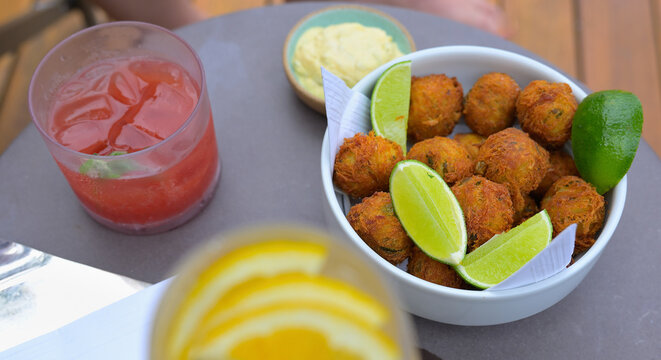Bolinhos de Bacalhau is a very popular snack or appetizer, with cocktails, whether at a hole in the wall or at a luxury hotel restaurant, Copacabana BR