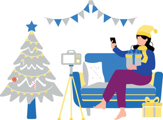 Girl making video with Christmas presents.