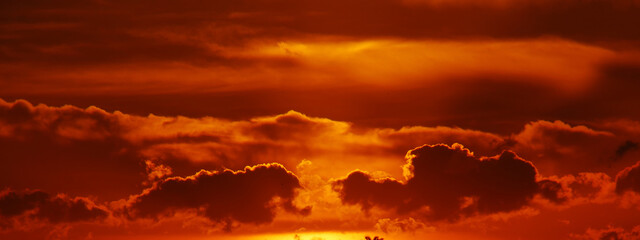 Banner Golden sky sunrise dramatic beautiful landscape view. Dawn sky gold dusk time cloudscape...