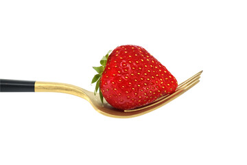 Fresh strawberry on gold fork isolated on white background