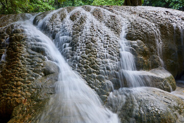 Scenic view of waterfall in forest 