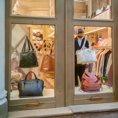 Luxury Parisian shopfront with fashion accessories in boutique window display, luxury, fashion, overprized, expensive, design, designer, handbag, store, shoes, dress, clothe, vintage, antique