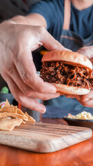 person eating burger