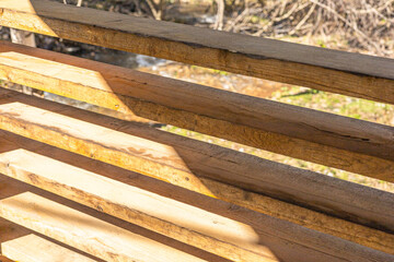 Wood fencing. Horizontal-Plank  Fence. Horizontal Wood Plank Fencing. fencing made of horizontally placed boards