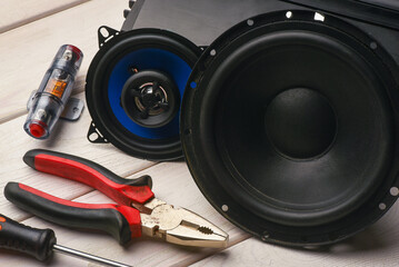 Naklejka premium Car audio stereo system installation concept background. Car audio system repair service concept.