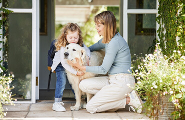 Mom, dog and child in backyard with backpack, smile and playful bonding with animal on school morning. Mother, girl and Labrador pet in home garden with embrace, love and kiss for kindergarten kid