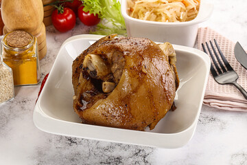 Baked pork knee with spices
