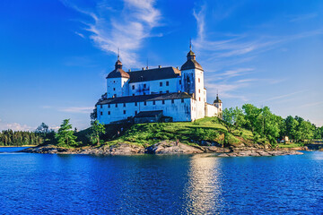 Läckö castle on a rock by Lake Vänern in Sweden  in the summer