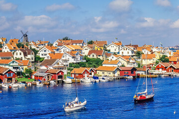 Fototapeta na wymiar Boats on the sea by a swedish old fishing village