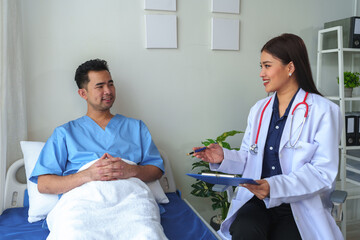 A female doctor uses a cardiac stethoscope to treat patients to analyze and listen to whether their...