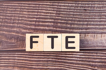 FTE - Full Time Equivalent acronym concept on cubes