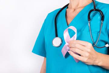 World Breast Cancer Day concept, healthcare - Pink breast cancer awareness ribbon, symbolic colored...
