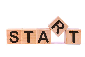 Start word concept written on a light table and light background