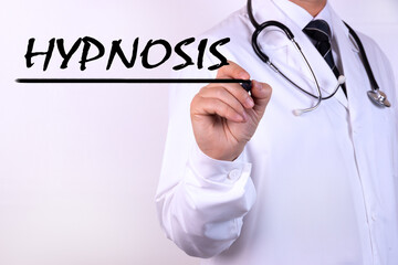 Doctor writing word Hypnosis with marker Medical concept