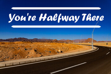 Inspirational quote on natural background. You're Halfway There.