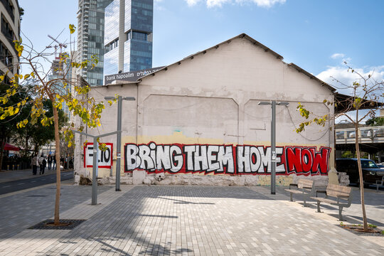 Tel Aviv, Israel - March 15, 2024. Bring Them Home graffiti on the wall