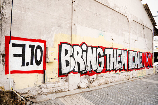 Tel Aviv, Israel - March 15, 2024. Bring Them Home graffiti on the wall