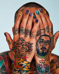 AI generated photo portrait of a brutal handsome man with tattoos and bright colored manicure. Isolated on white background