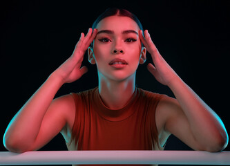 Portrait, ballet and woman with training, dancing and energy on dark studio background. Face, person and model with performance, routine or practice with talent, ballerina and culture with confidence