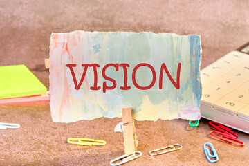 VISION word written on paper in a clothespin